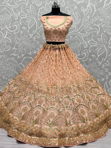 Glamorous Peach Sequined Embroiderey Net Reception Wear Lehenga Choli